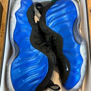 Vibrant Blue and Black Nike sneakers